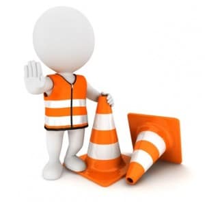 3d white people stop sign with traffic cones
